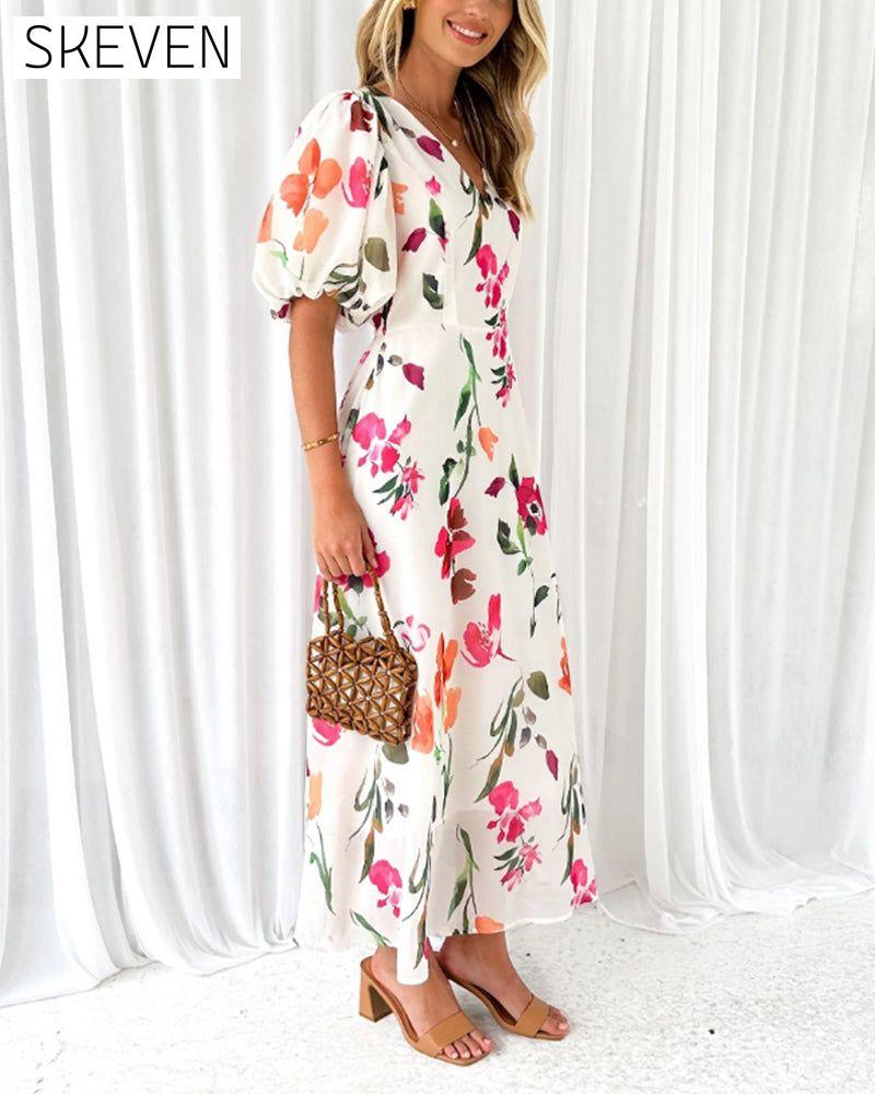 Elegantes Kleid mit Puffärmeln und Blumenmuster