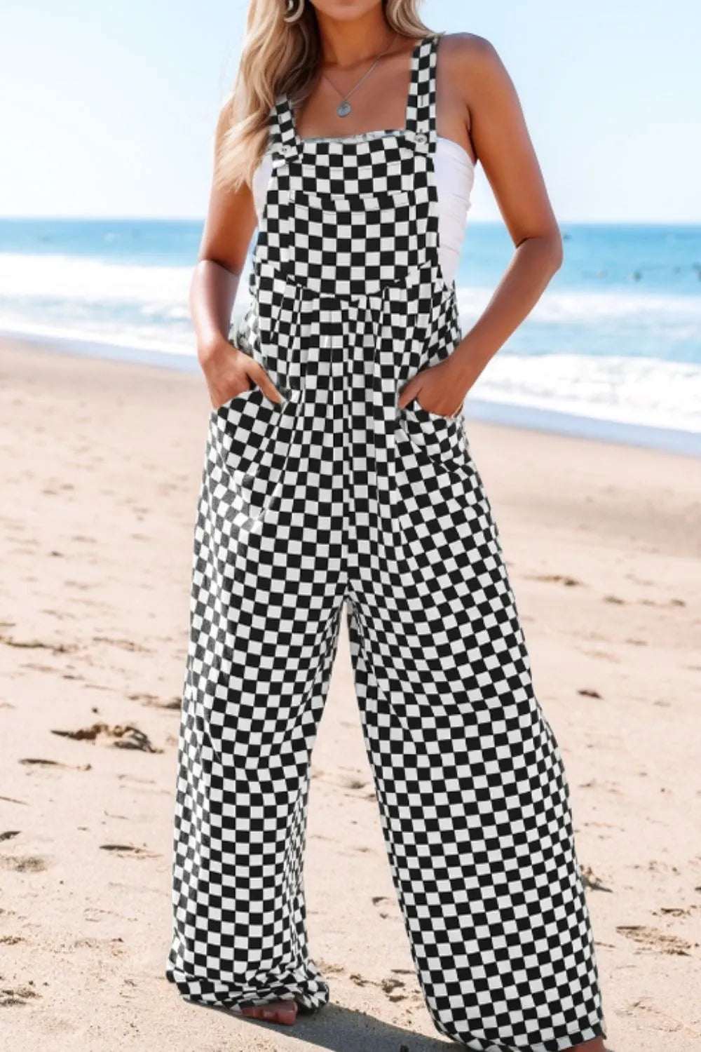 Jumpsuit mit Karomuster, Taschen und weitem Bein