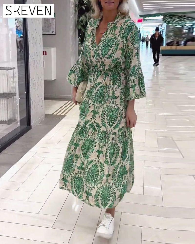Bedrucktes Kleid mit Glockenärmeln und Kordelzug