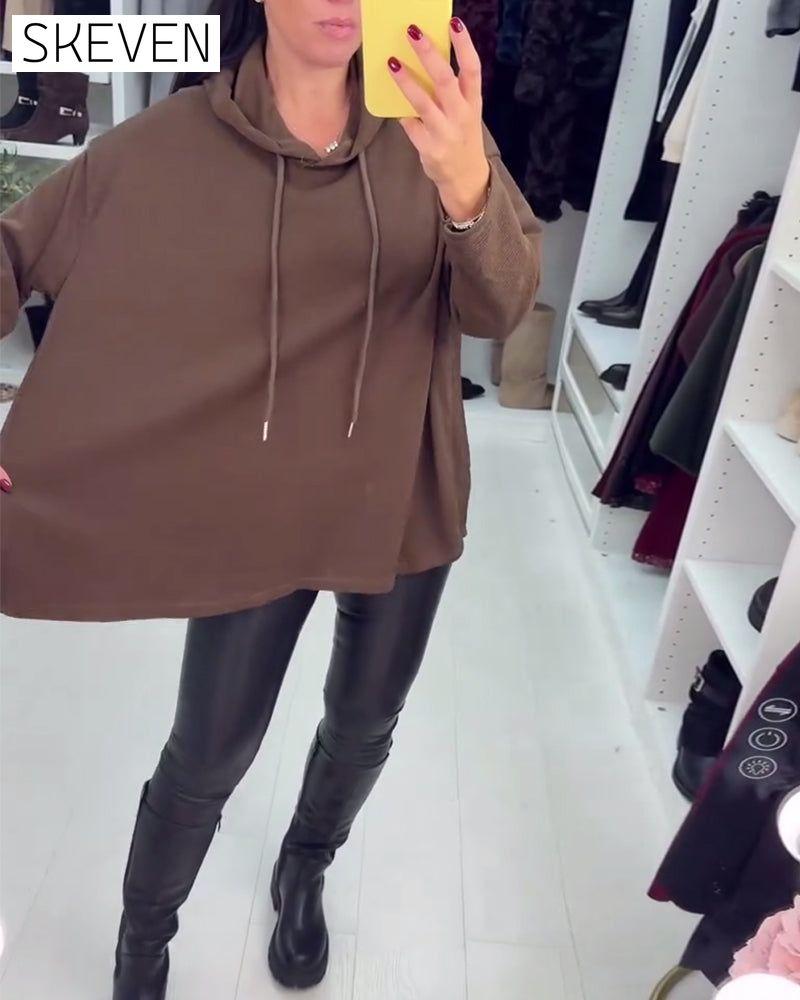Sweat à capuche à manches longues, coupe asymétrique et ample, couleur unie