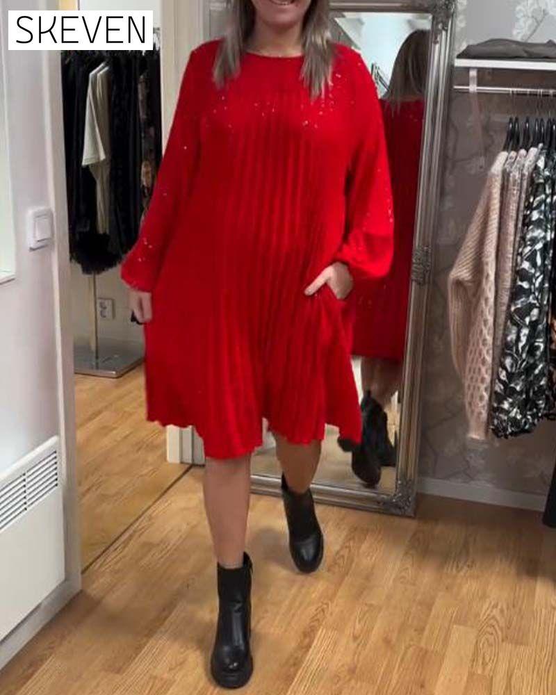 Locker geschnittenes Kleid mit Puffärmeln und Raffungen