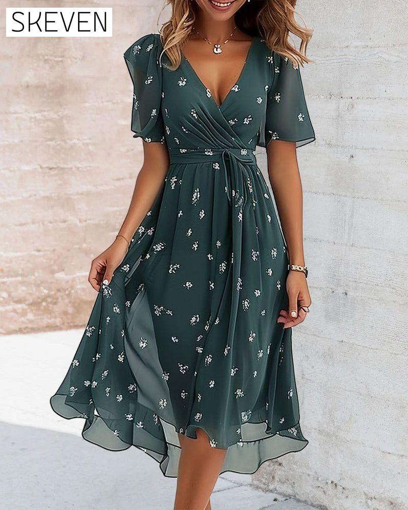 Elegantes bedrucktes Kleid mit Bindeband und V-Ausschnitt