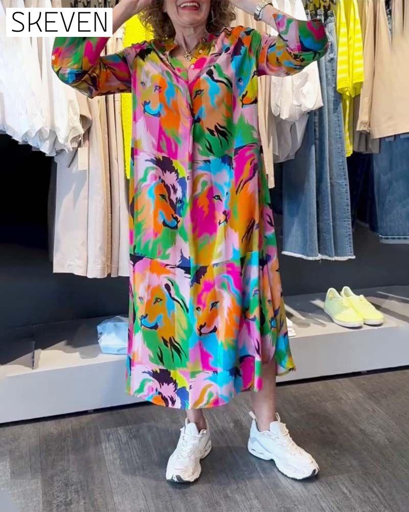Kleid mit farbigem Aufdruck und Taschen