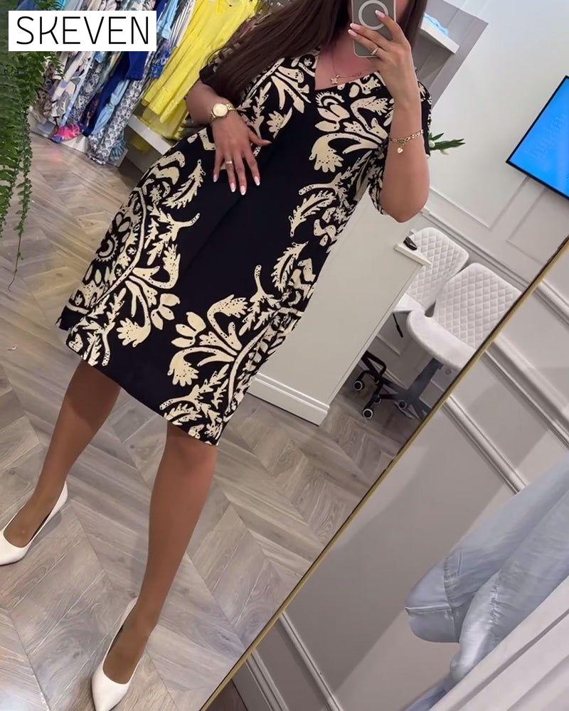 Robe ample rétro imprimée à col en V et manches courtes