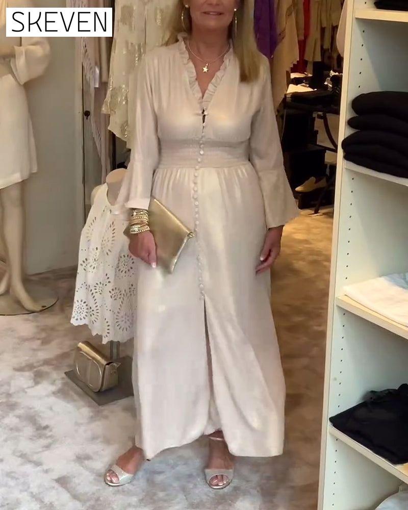 Langes Kleid mit Spitzenkragen und Knopfleiste in der Taille