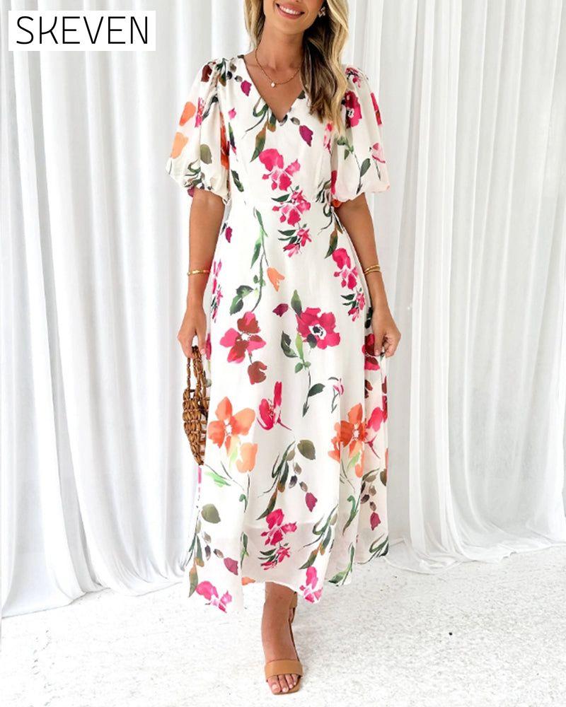 Elegantes Kleid mit Puffärmeln und Blumenmuster