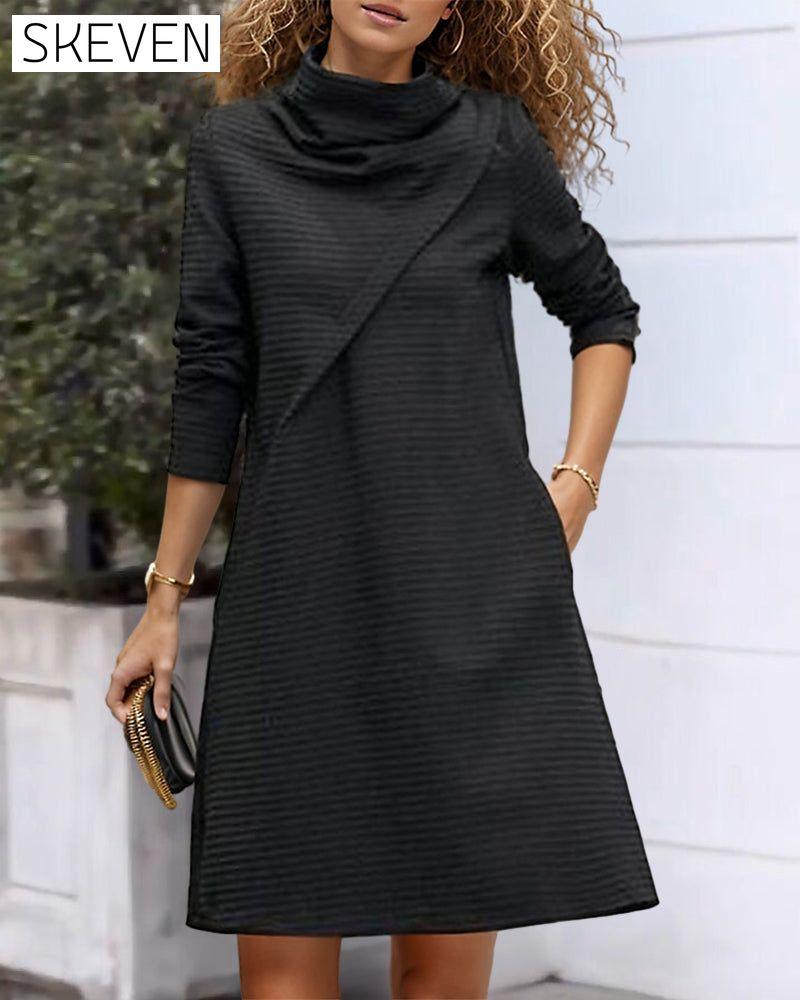 Couture-Kleid mit hohem Kragen und Taschen