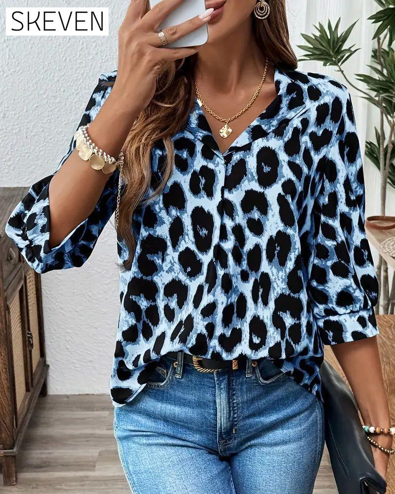 Halbärmelige, lockere Bluse mit Leopardenmuster