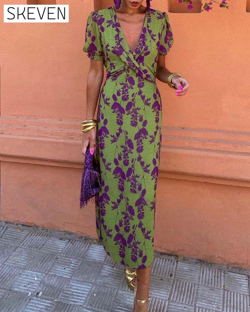 Elegantes A-Linien-Kleid mit Blätterprint, tiefem V-Ausschnitt und Puffärmeln