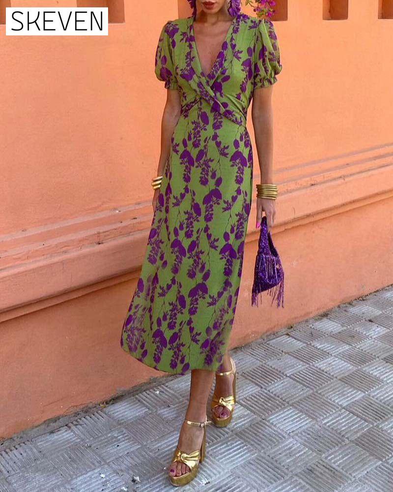 Elegantes A-Linien-Kleid mit Blätterprint, tiefem V-Ausschnitt und Puffärmeln