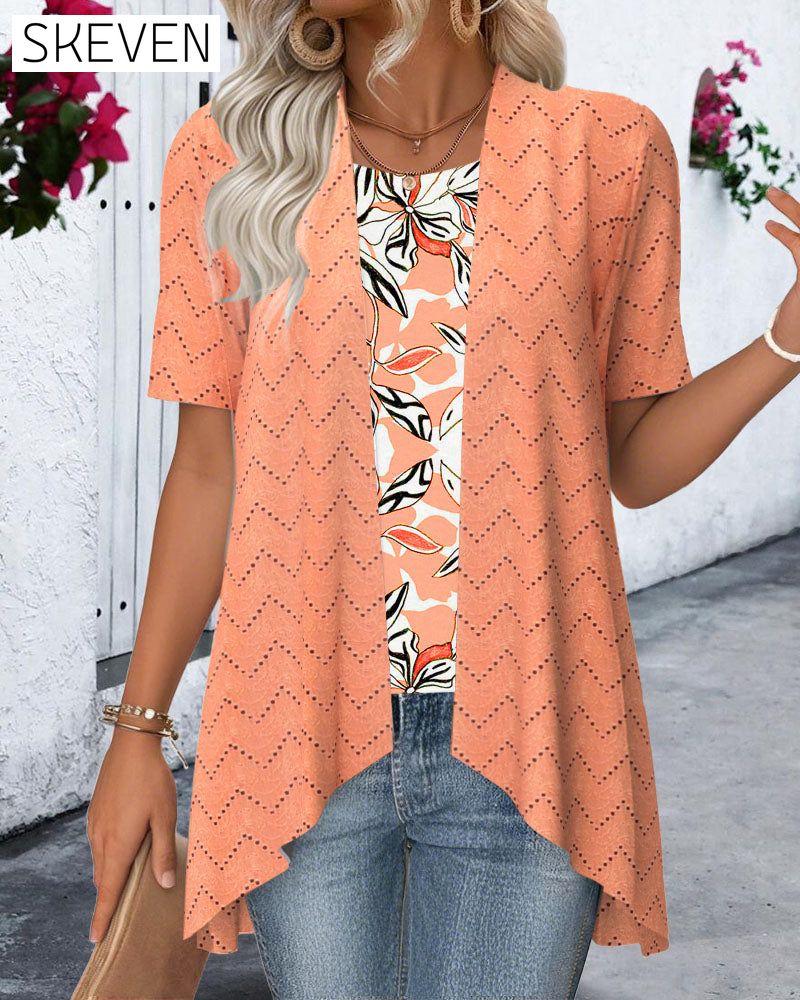 Bluse mit angedeutetem zweiteiligem Lochmuster