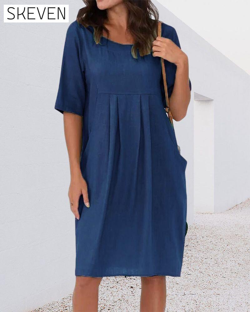 Robe unie à col rond et poches