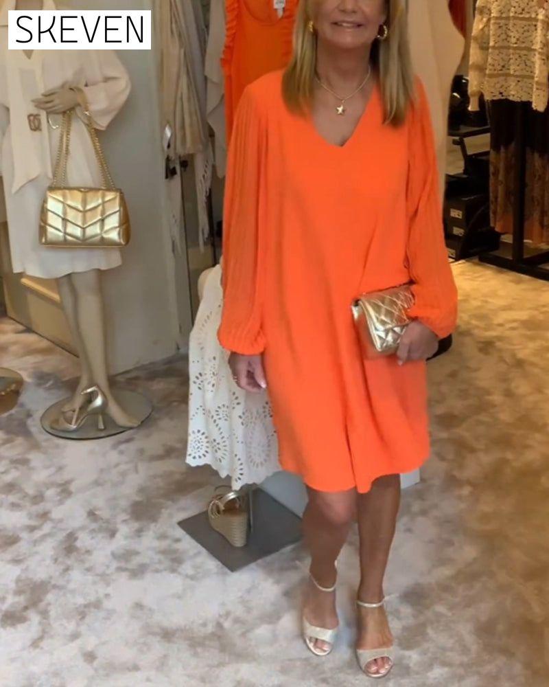 einfarbiges Kleid mit Laternenärmeln und V-Ausschnitt