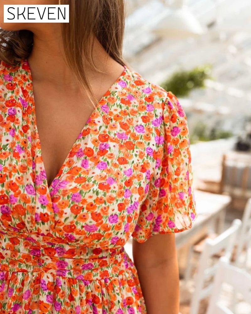 Blumenkleid mit V-Ausschnitt und Taille