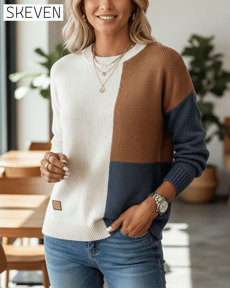 Modischer Pullover mit Farbblockmuster