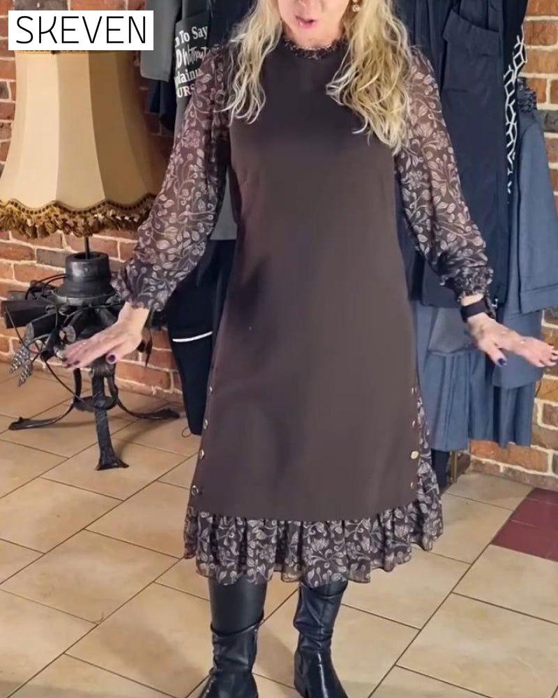 Kleid mit Rundhalsausschnitt und angedeutetem Zweiteiler
