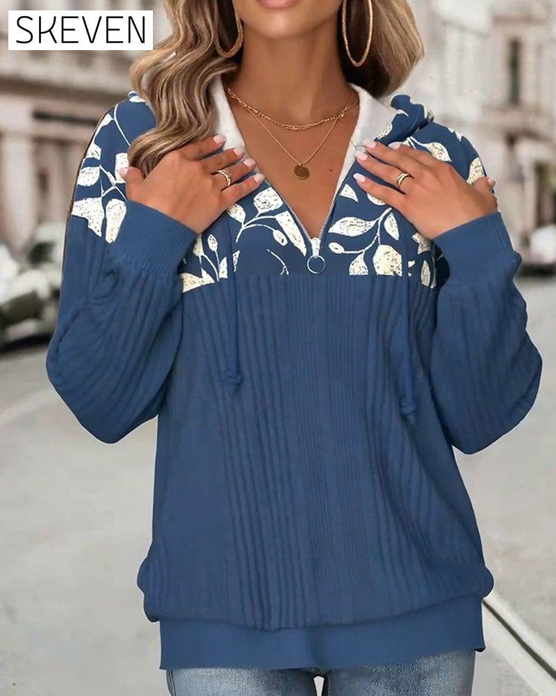 Sweat-shirt à capuche zippé à demi-hauteur et imprimé floral