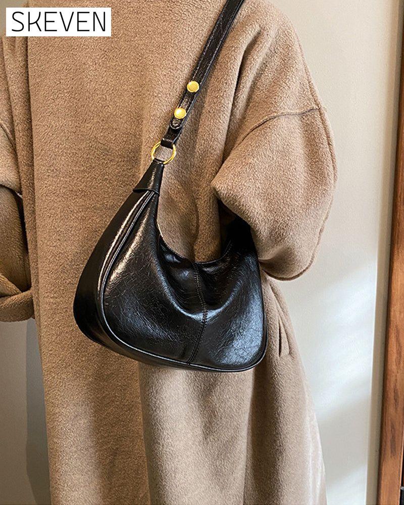 Achseltasche aus gewachstem Leder 