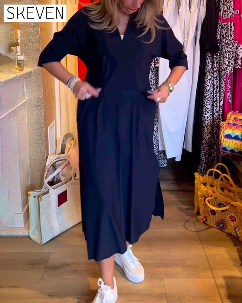 Kleid mit V-Ausschnitt und Taschen