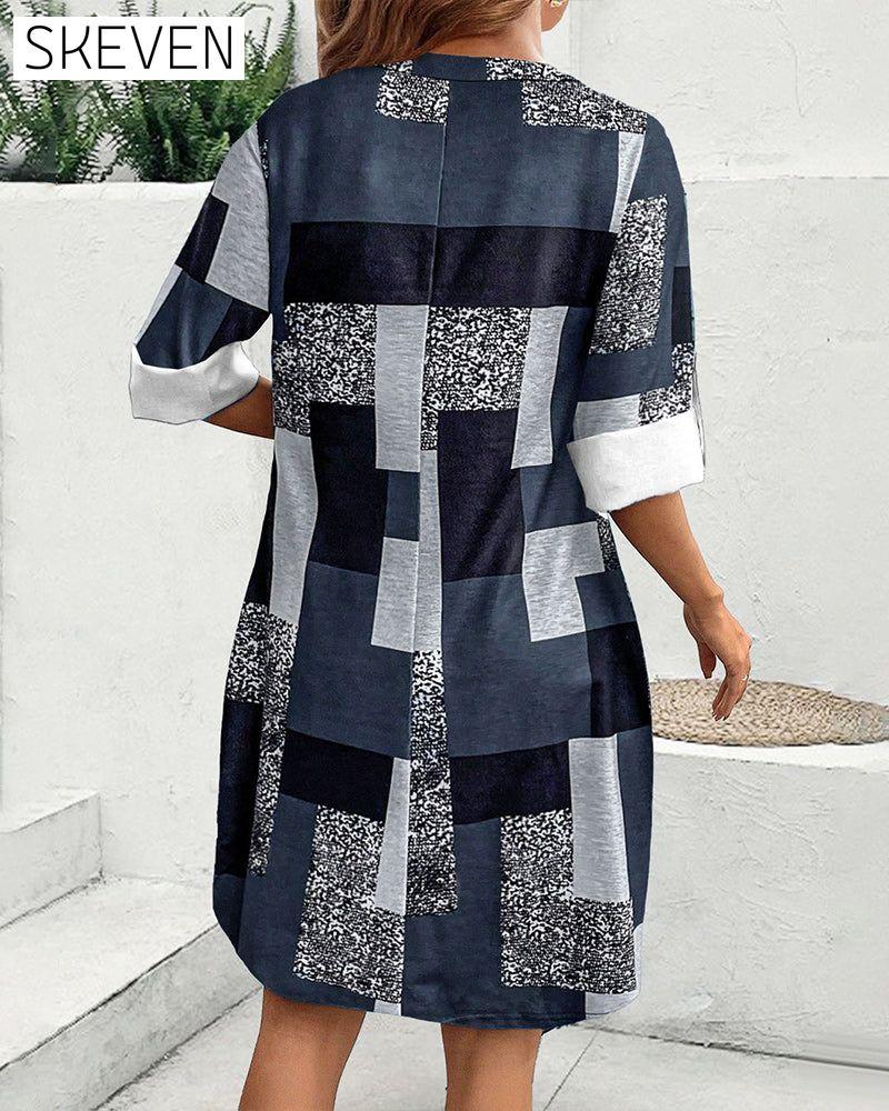 Kleid mit Karomuster und Knöpfen