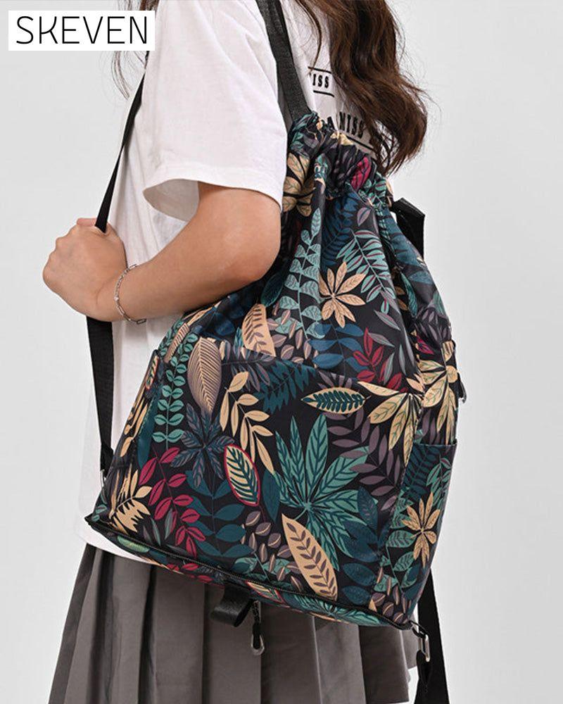 Schultertasche im Ethno-Stil mit Kordelzug