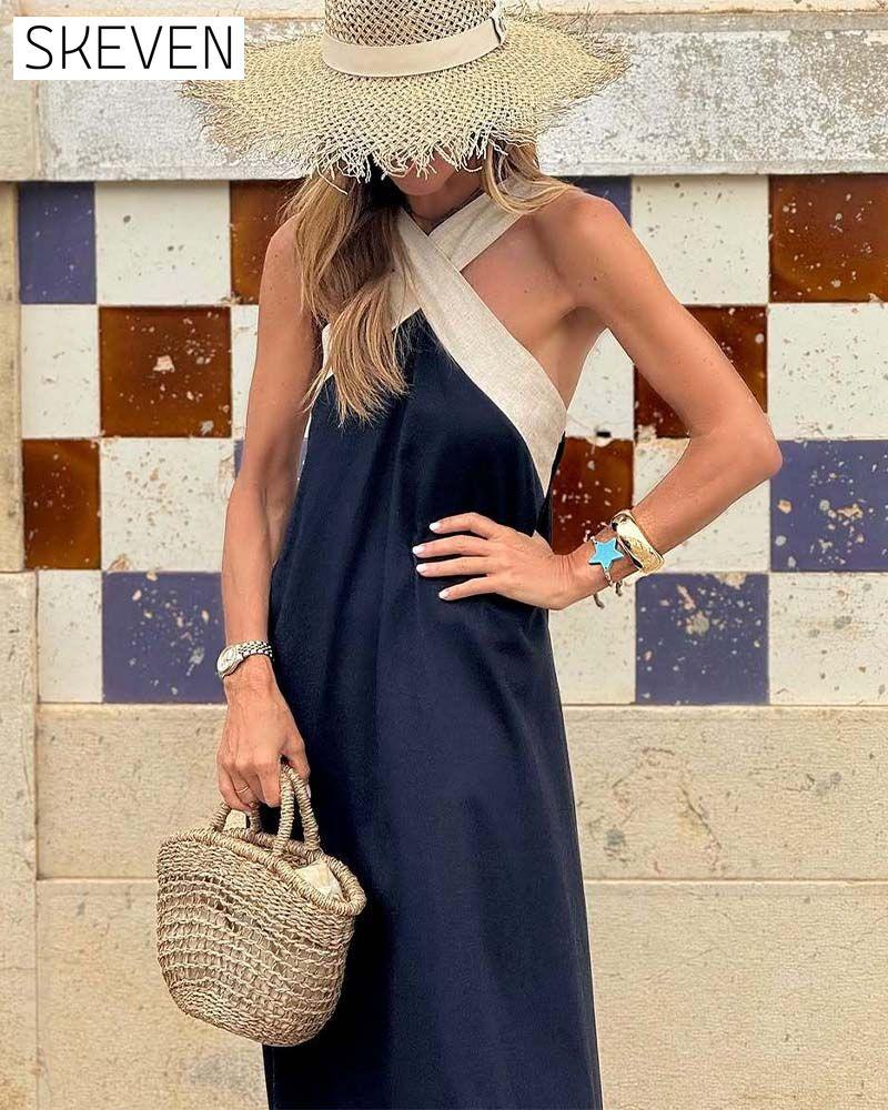 Elegantes Kleid mit gekreuztem Rückenausschnitt und Kontrastfarbe