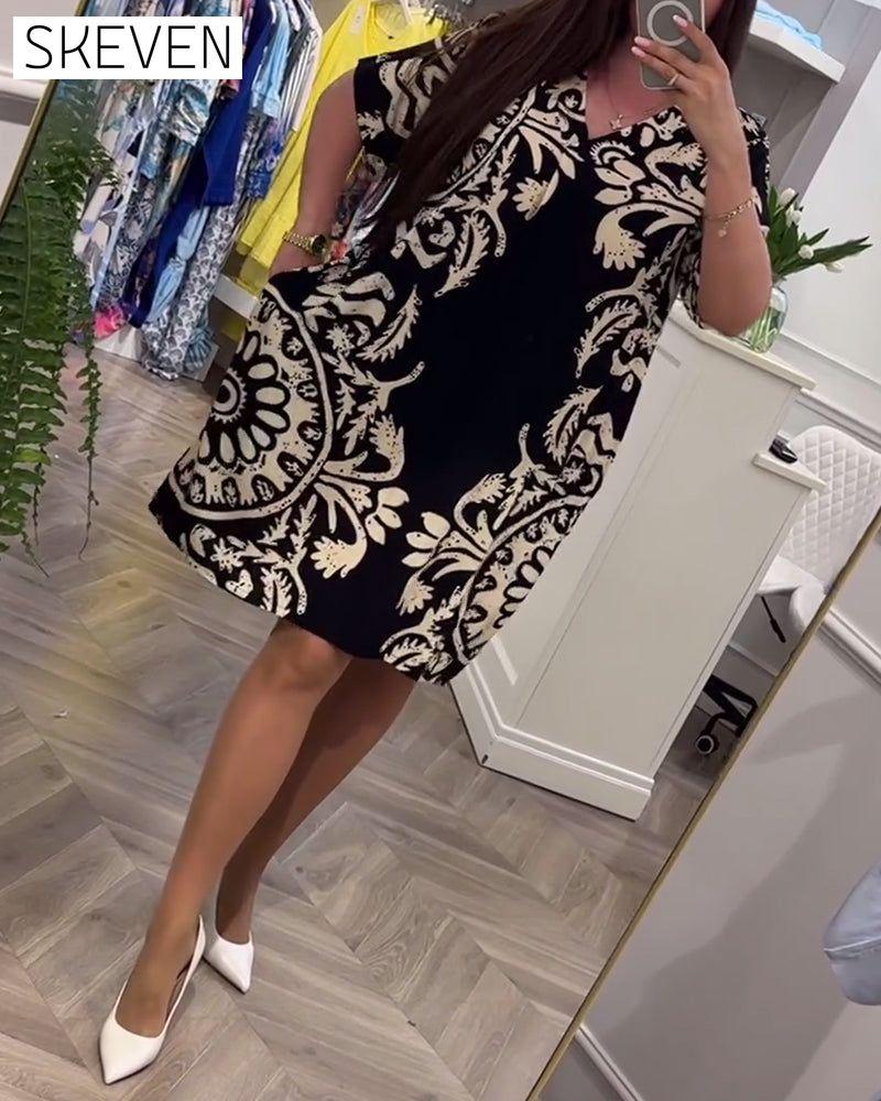 Robe ample rétro imprimée à col en V et manches courtes