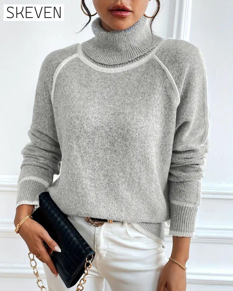 Pull à col roulé tendance à couleurs contrastées