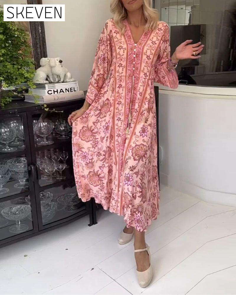 Elegantes bedrucktes Kleid mit V-Ausschnitt, Knopfleiste und Kordelzug
