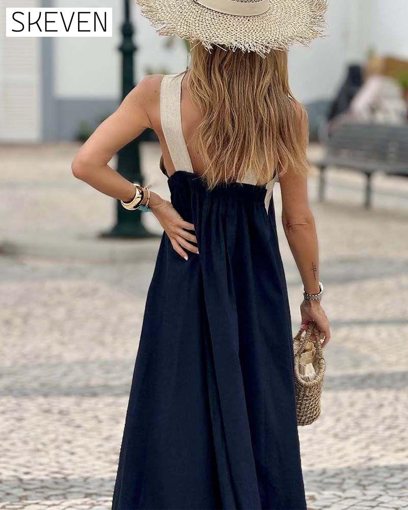 Elegantes Kleid mit gekreuztem Rückenausschnitt und Kontrastfarbe