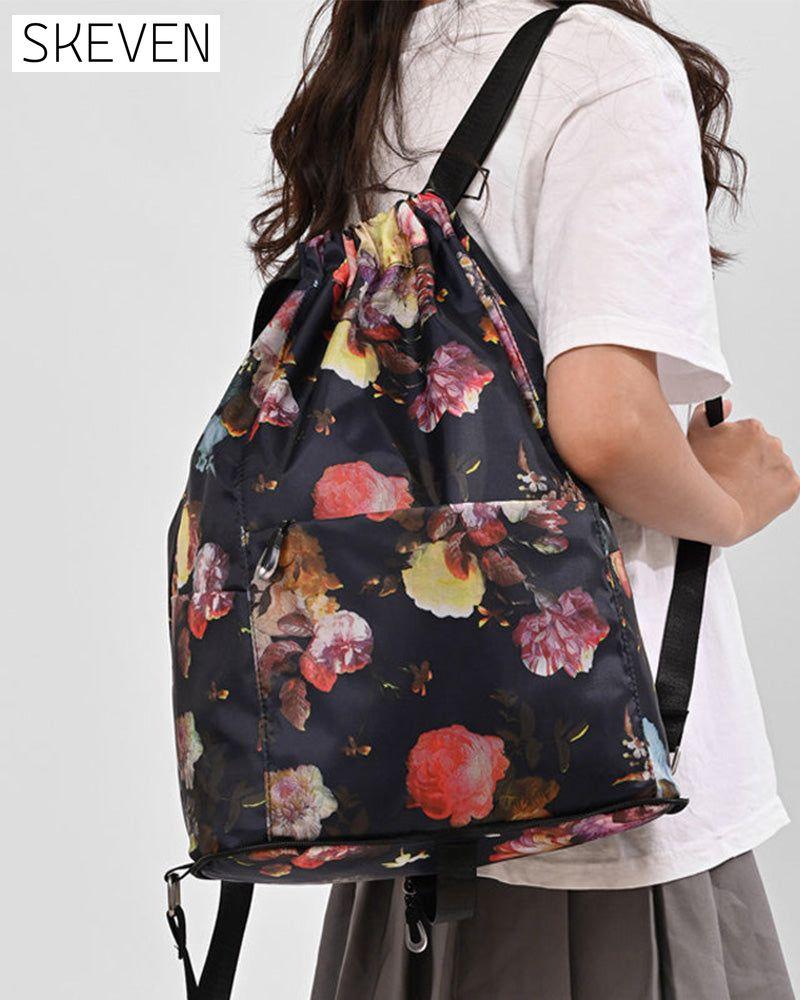 Schultertasche im Ethno-Stil mit Kordelzug