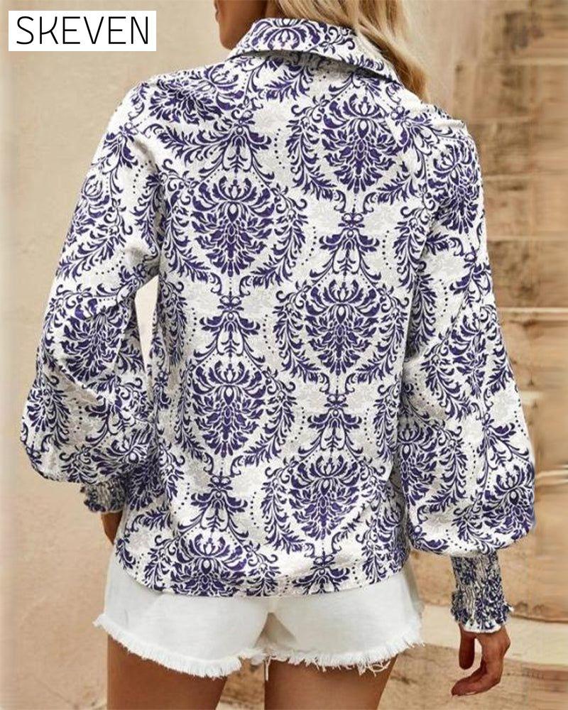 Bluse im Retro-Stil mit Knöpfen und Blumenmuster