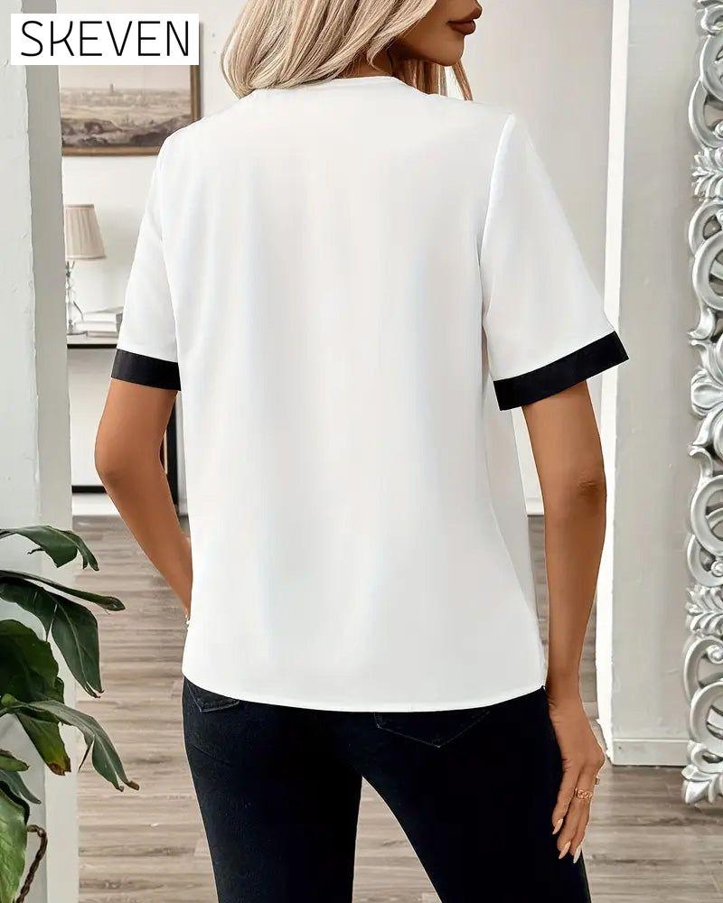 Bluse mit Kontrastkragen und Knopfleiste