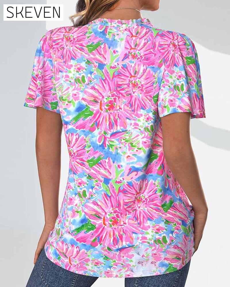 Short-sleeved floral button-up blouse