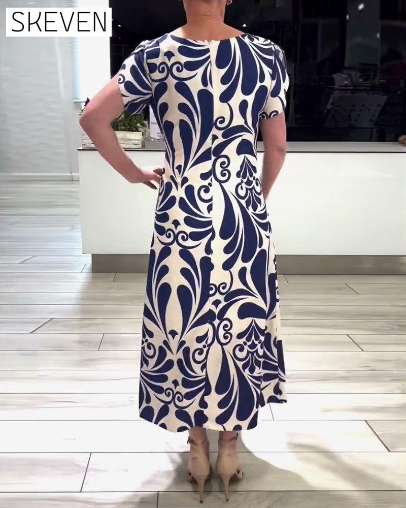 Elegantes Kurzarmkleid mit Kontrastprint
