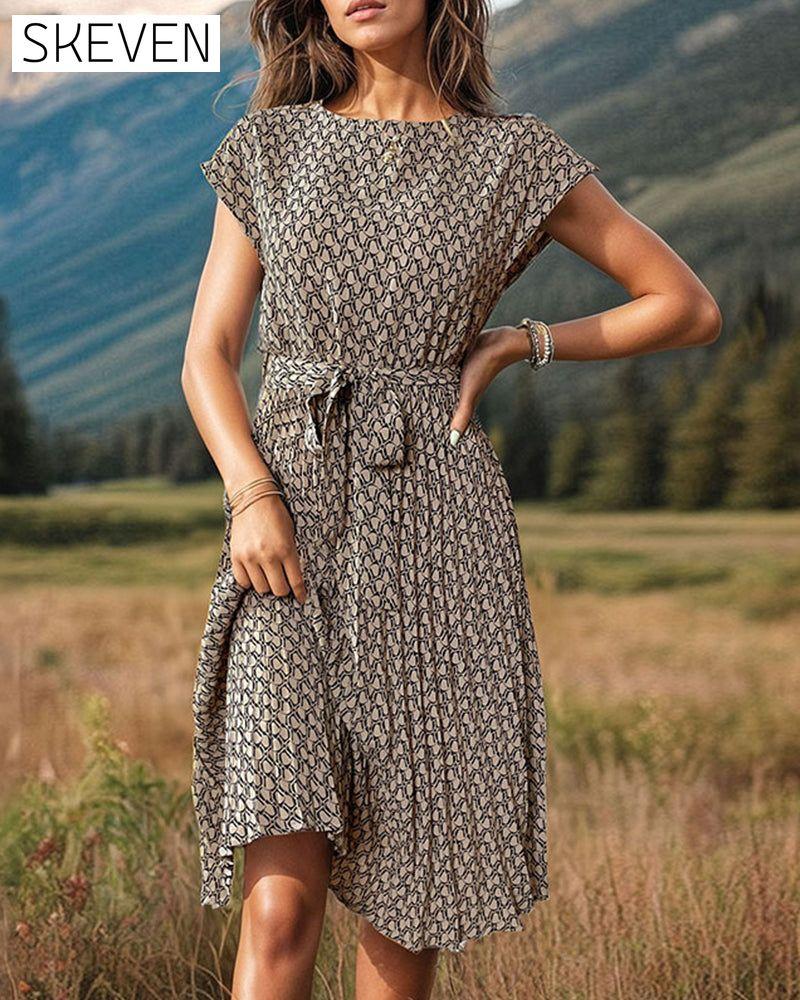 Bedrucktes Kleid mit Schnürung, Dolmanärmeln und Rundhalsausschnitt