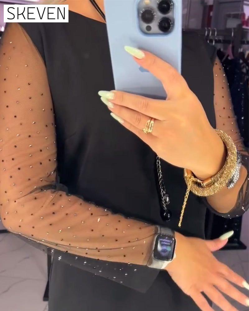 Robe à col rond et coutures en maille transparente