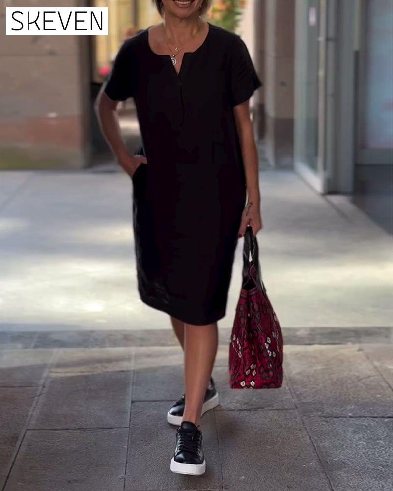 Einfarbiges Kurzarmkleid mit V-Ausschnitt und Taschen