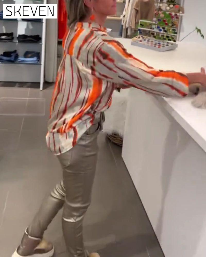Long sleeve striped print blouse
