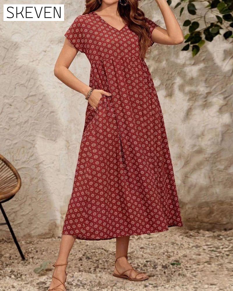Langes Kleid mit V-Ausschnitt und kurzen Ärmeln