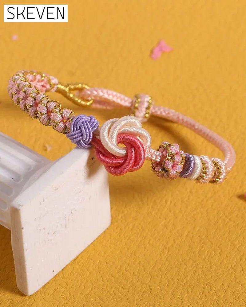 Bracelet with knot of peach blossoms