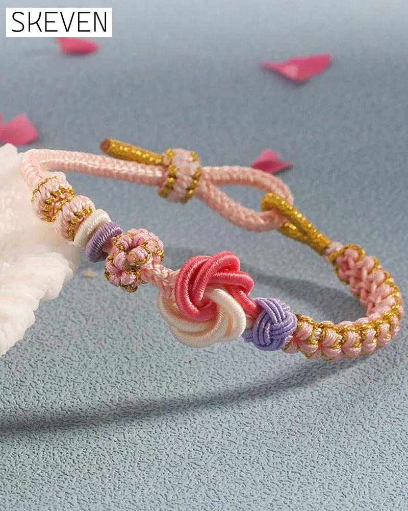 Bracelet with knot of peach blossoms