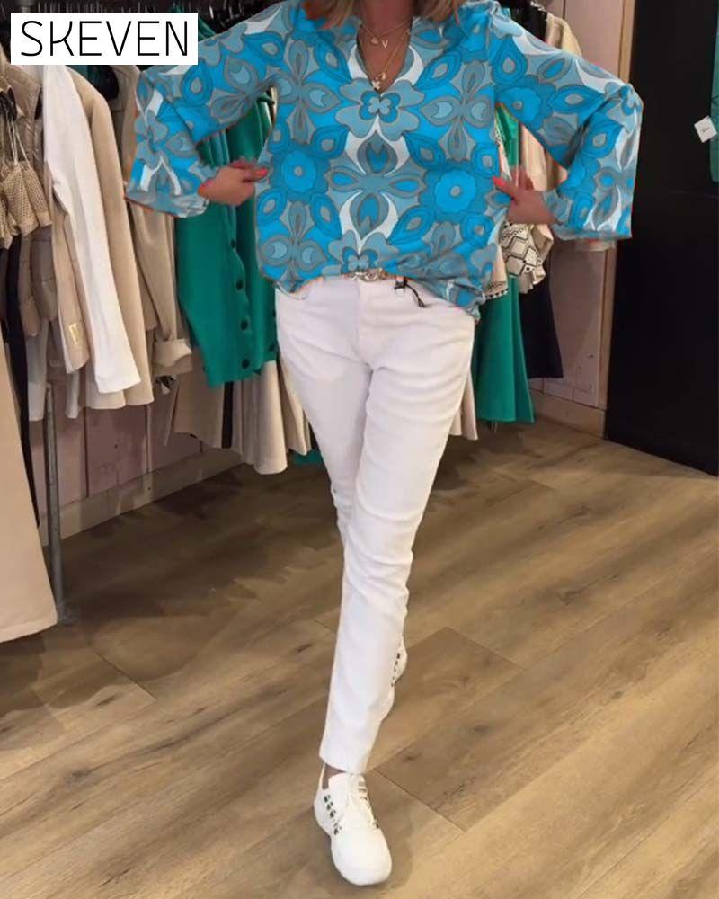 Lockere und vielseitige bedruckte Bluse