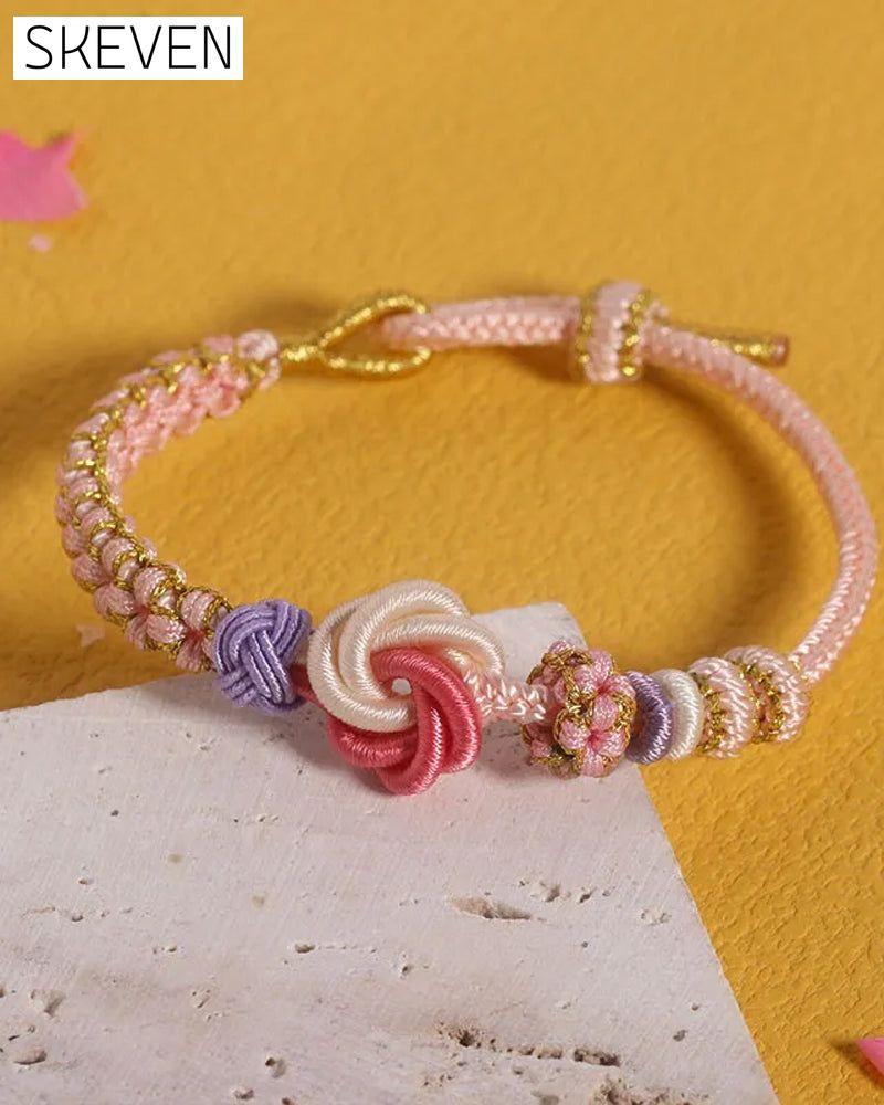 Bracelet with knot of peach blossoms