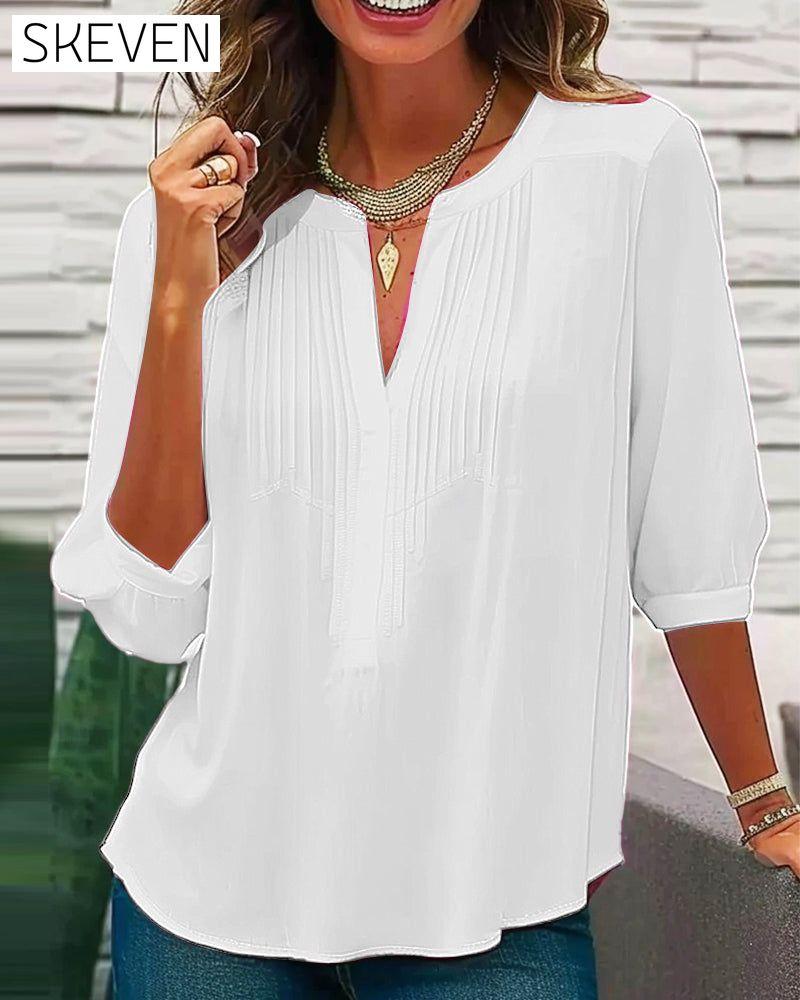 V-neck pleated solid color blouse