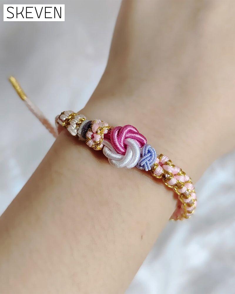 Bracelet with knot of peach blossoms