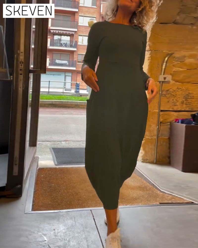 Solid color round neck long sleeve pocket dress