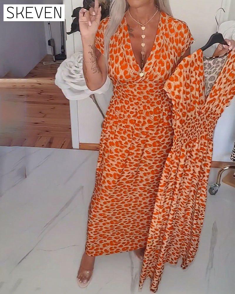 Elegantes Kleid mit Leopardenmuster und V-Ausschnitt