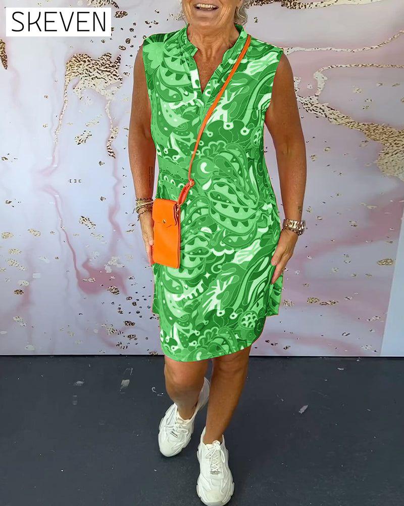 Elegantes, ärmelloses Kleid mit Print und V-Ausschnitt