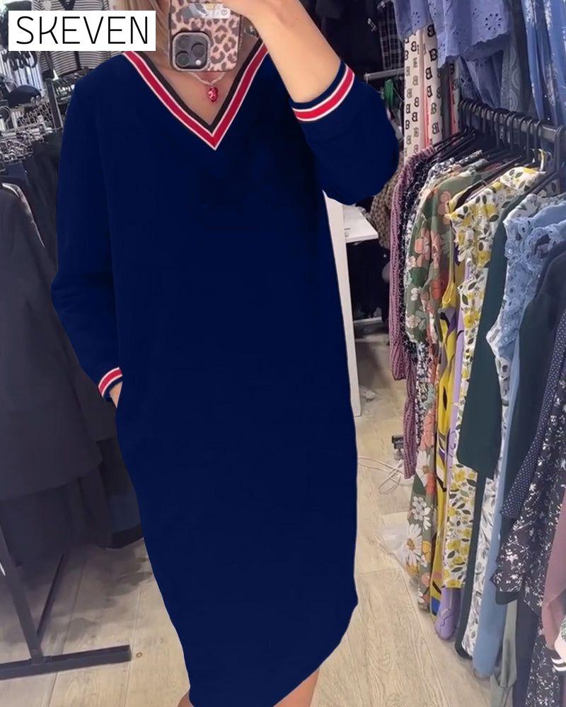Robe élégante à col en V avec poches